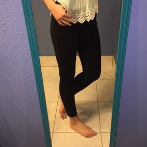 Black dress pant with decorative buttons